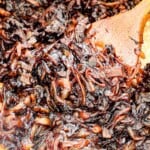 up close of caramelized onions showing how deeply caramelized and dark, and jammy they are