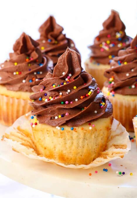up close of chocolate buttercream frosting on a cupcake showing how thick and pipable it is