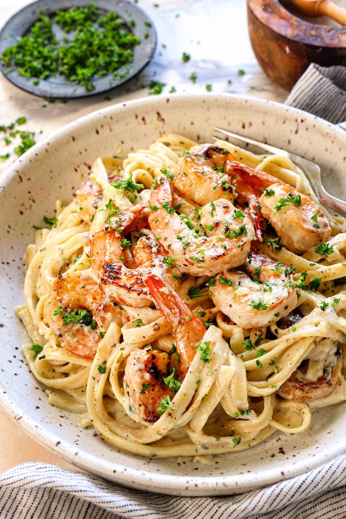 easy fettuccine alfredo and shrimp in a plate showing how creamy it is