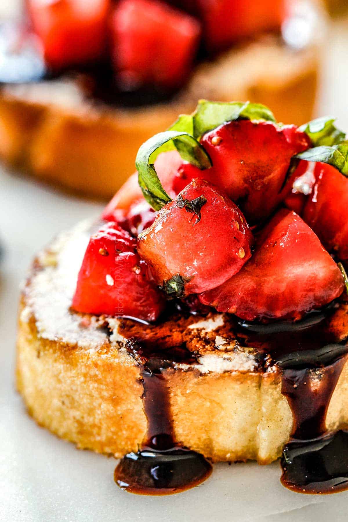 showing how to use balsamic glaze (balsamic reduction) by drizzling over bruschetta