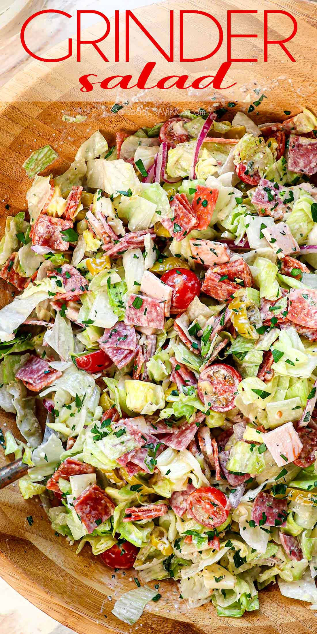 top view of Grinder Salad being tossed together showing the finely chopped ingredients