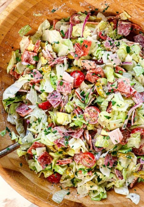 top view of Grinder Salad being tossed together showing the finely chopped ingredients