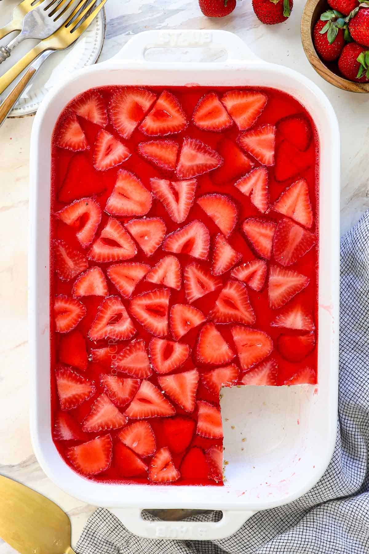 showing how to make strawberry pretzel salad by chilling the salad to set