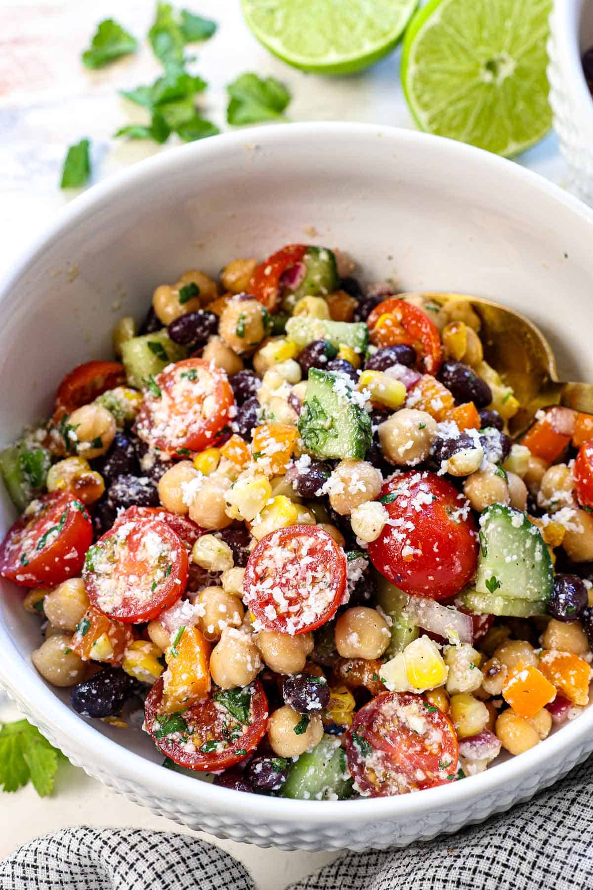up close of Dense Bean Salad in a bowl showing the ingredients
