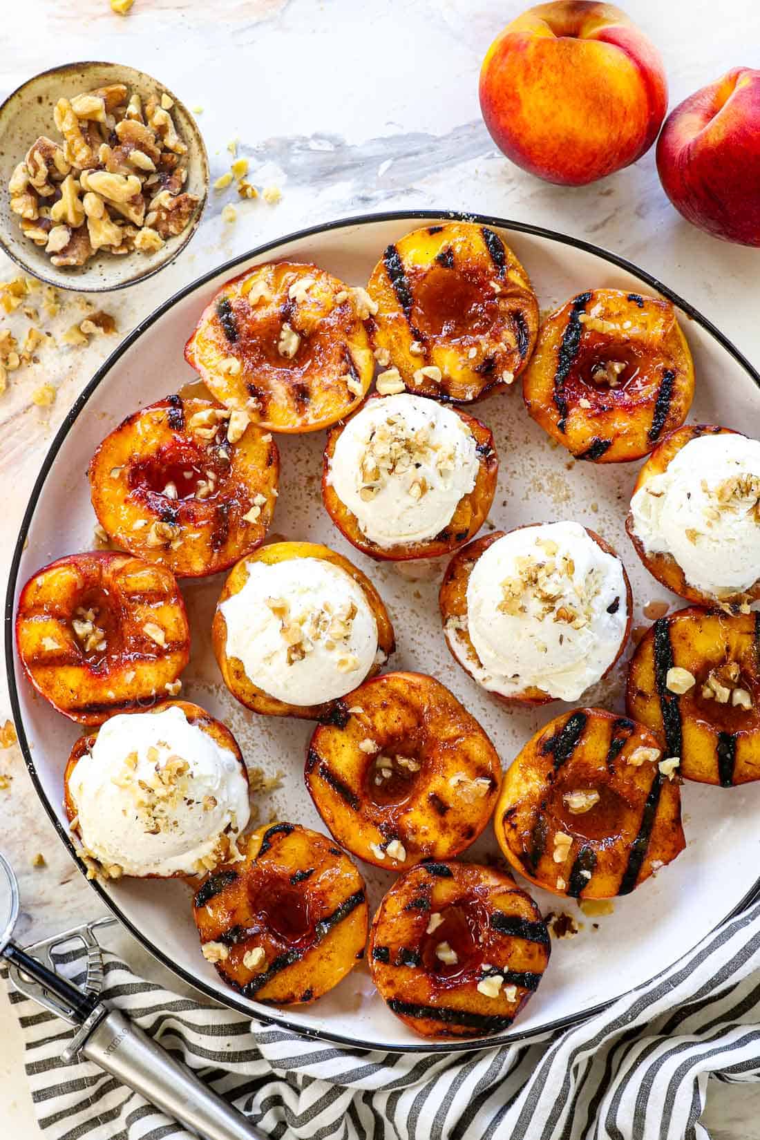 top view of serving grilled peaches recipe topped with vanilla ice cream