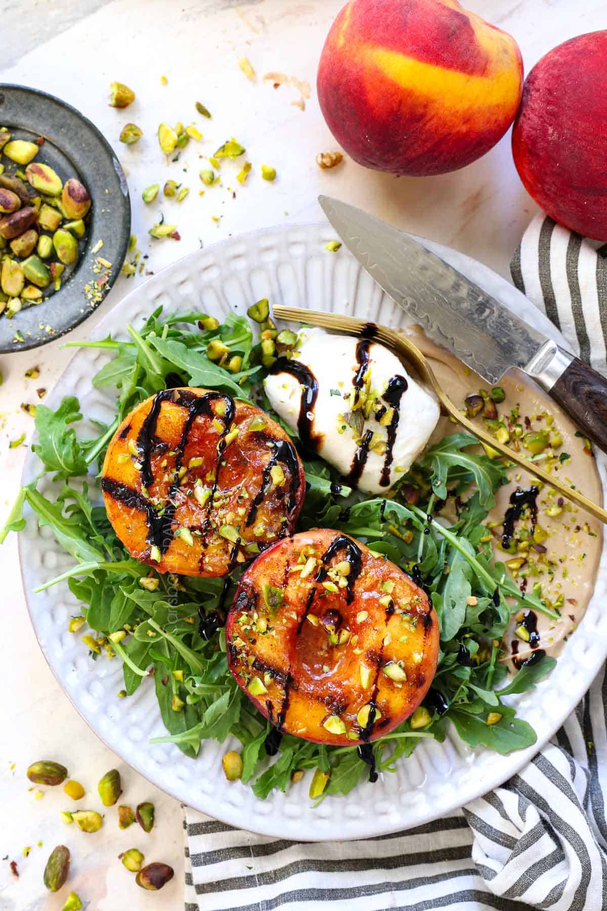 showing how to make grilled peaches with arugula and burrata to make a salad