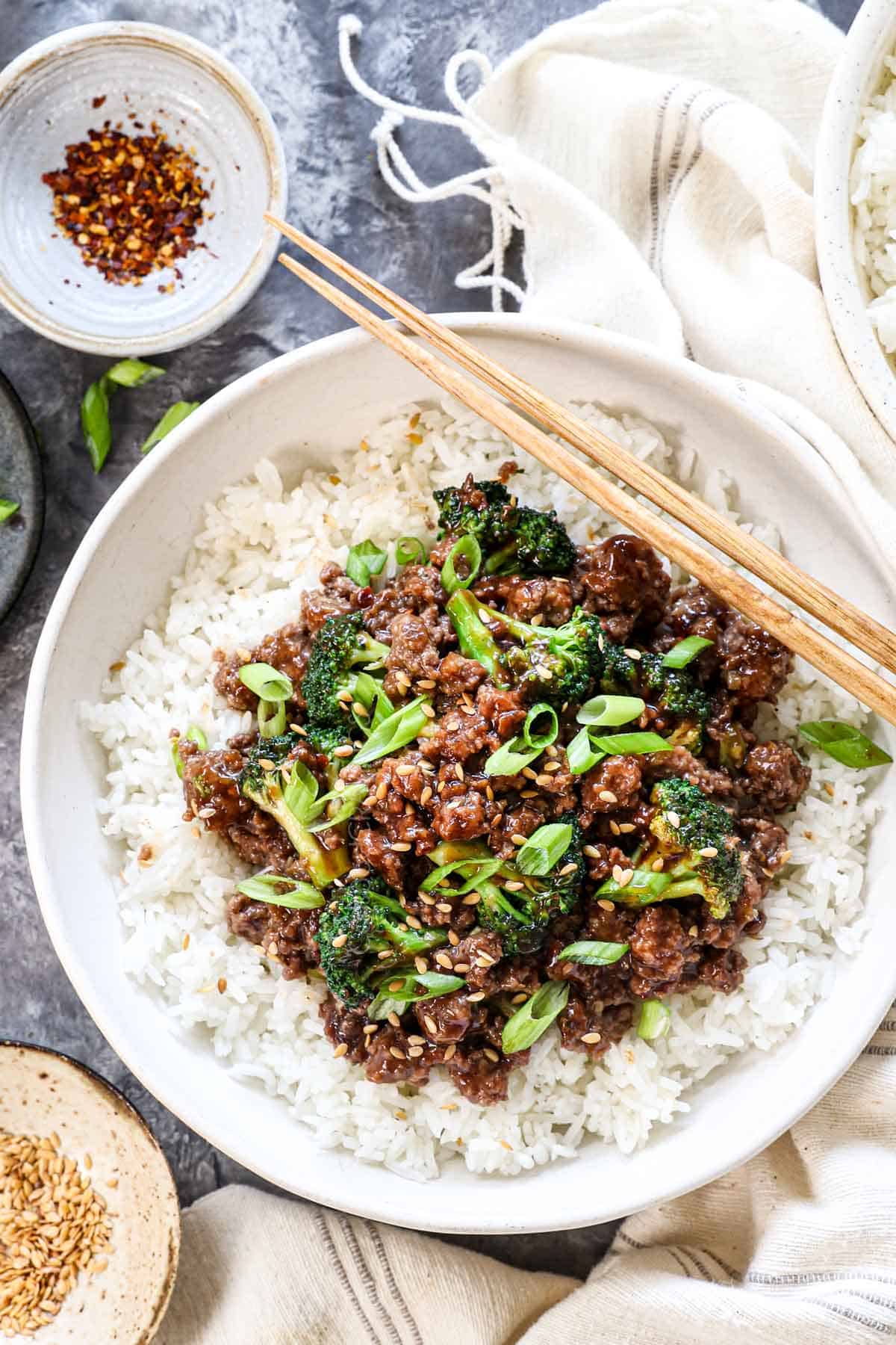 top view of ground beef and broccoli stir fry served over rice