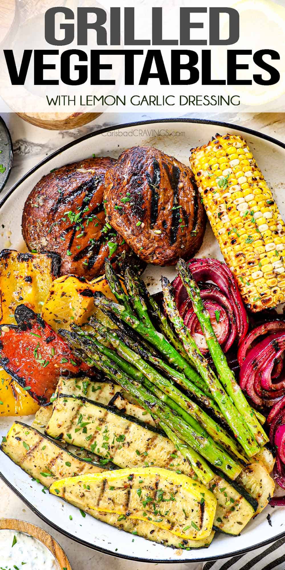 top view of grilled vegetables on a serving platter garnished with parsley