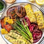 showing how to serve grilled vegetables recipe on a platter spread out so they don't steam