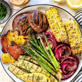 showing how to serve grilled vegetables recipe on a platter spread out so they don't steam