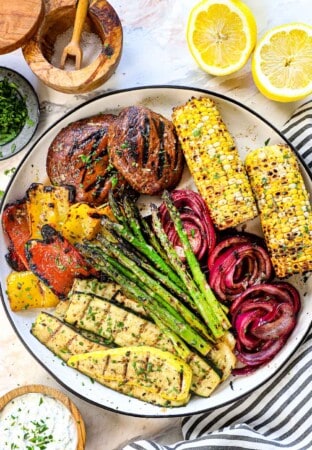 showing how to serve grilled vegetables recipe on a platter spread out so they don't steam