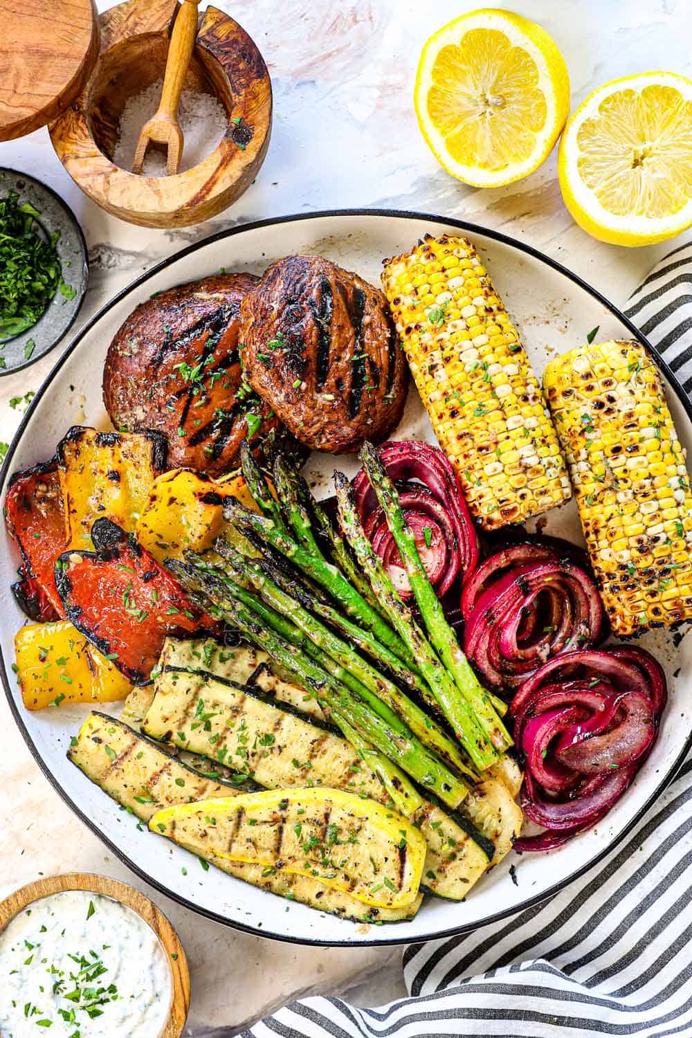 showing how to serve grilled vegetables recipe on a platter spread out so they don't steam