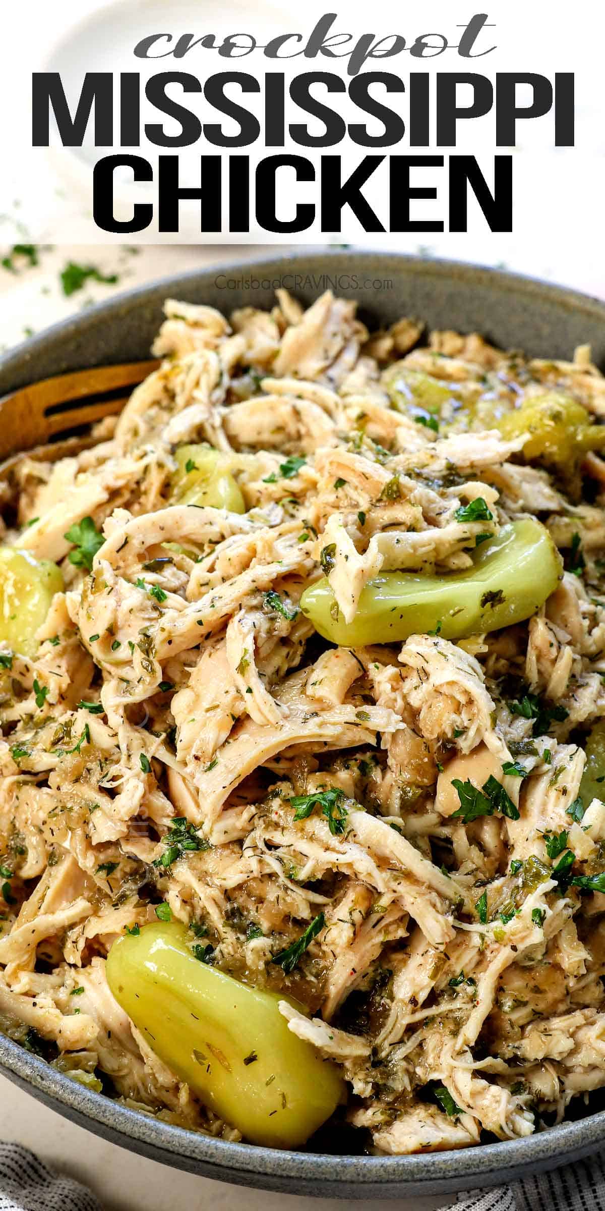 up close of Mississippi chicken in a bowl showing how juicy it is
