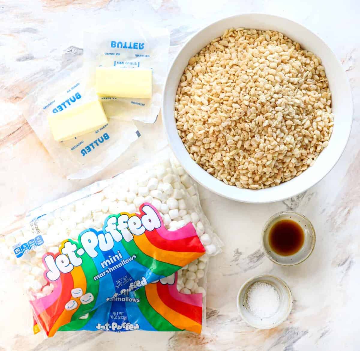 top view of Rice Krispie Treat recipe ingredients: Rice Krispie cereal, butter, vanilla, kosher salt