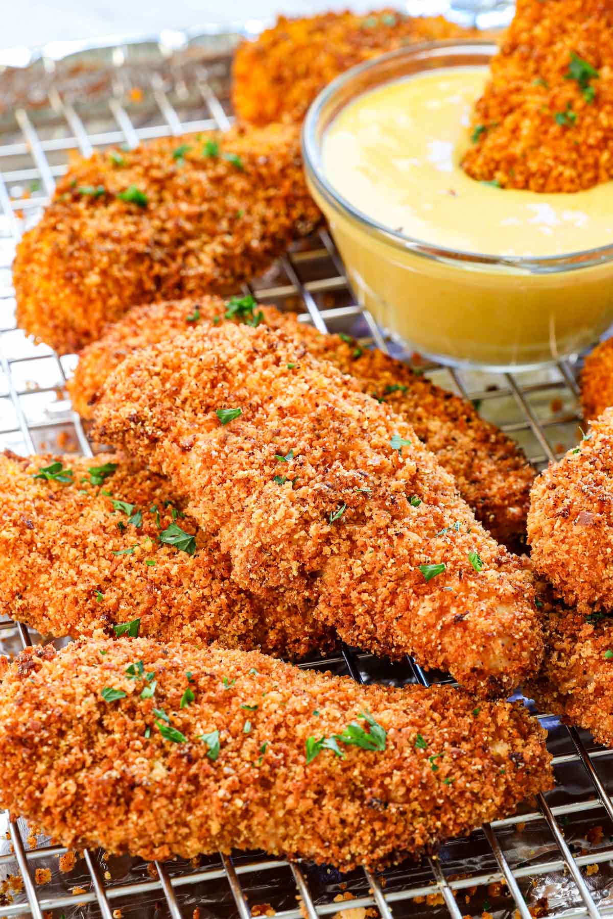 up close of chicken tenders (strips) showing how crispy they are