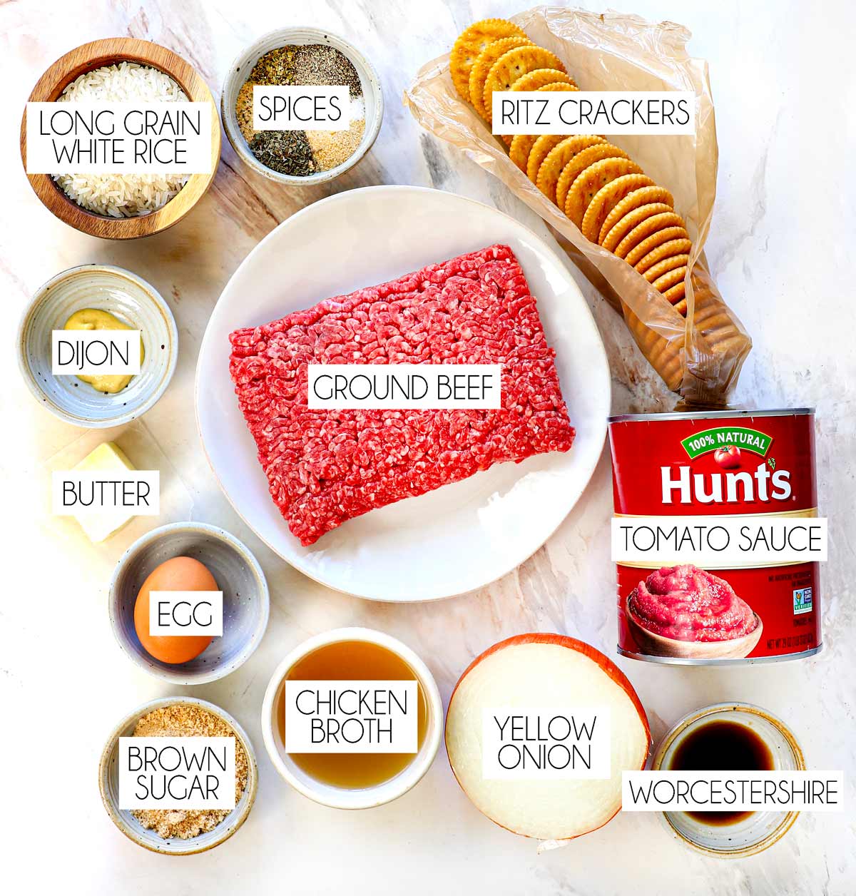 top view of Porcupine Meatballs Ingredients: ground beef, tomato sauce, long grain white rice, onion, Worcestershire sauce, brown sugar, chicken broth, Dijon, butter, Ritz crackers, spices
