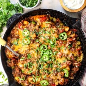 ground beef and potatoes in a skillet