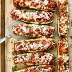 showing how to make zucchini boats by baking until the cheese is melted