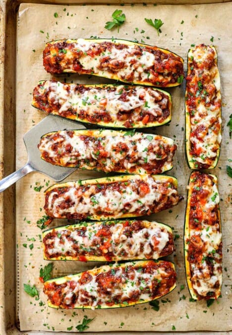 showing how to make zucchini boats by baking until the cheese is melted
