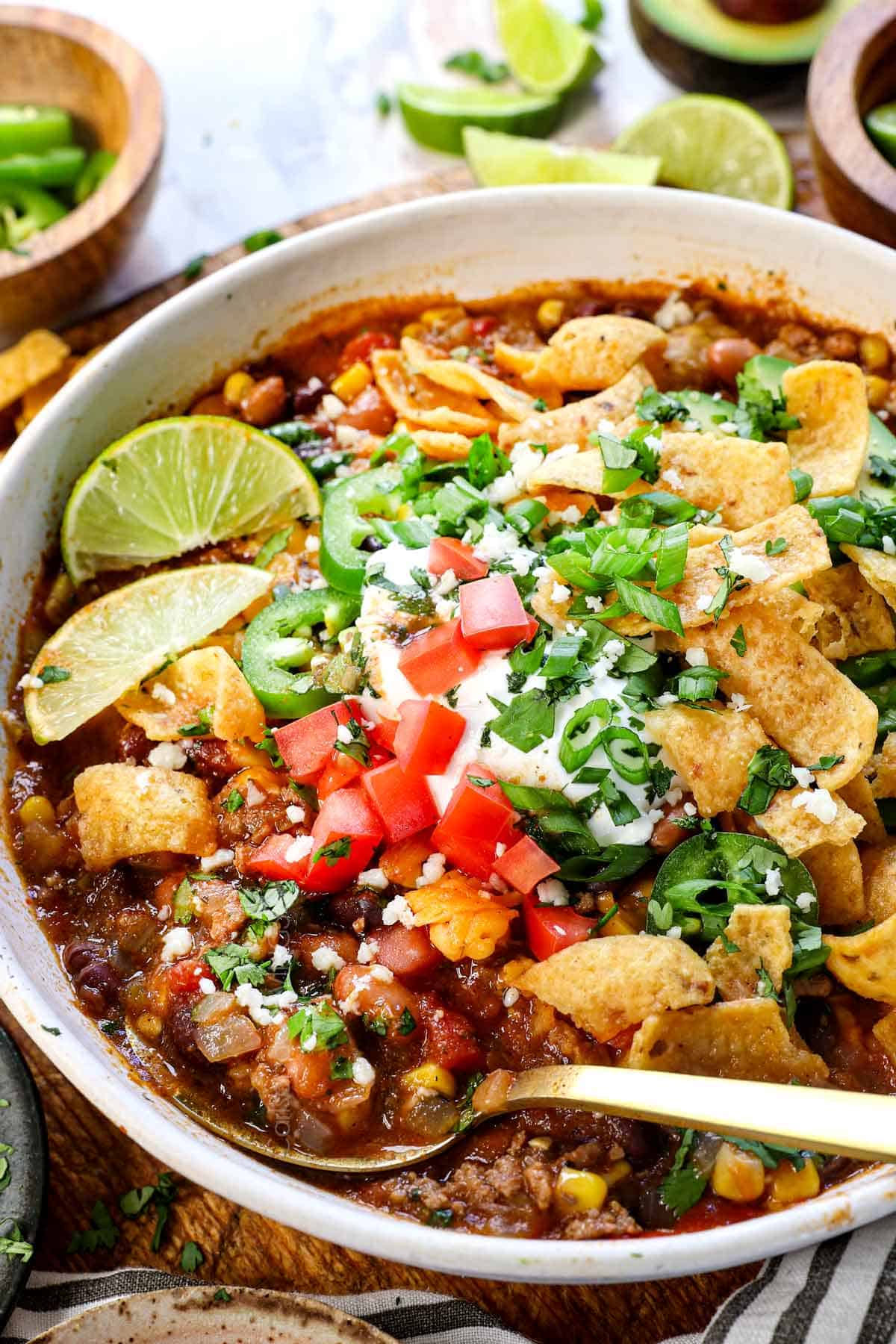 up close of serving crockpot taco soup recipe in a bowl showing the thick texture