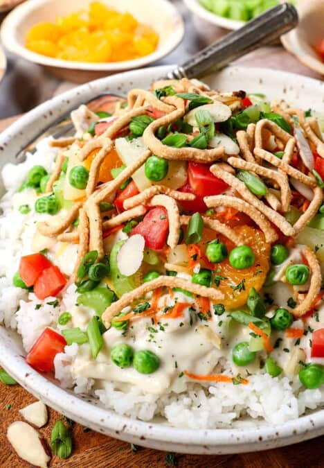 up close of Hawaiian Haystacks with homemade chicken gravy over rice with lots of toppings