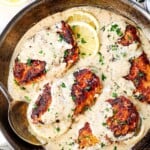 Top view of Lemon Chicken in a skillet with creamy lemon sauce