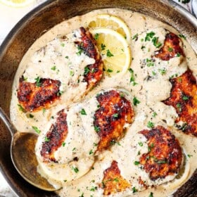 Top view of Lemon Chicken in a skillet with creamy lemon sauce