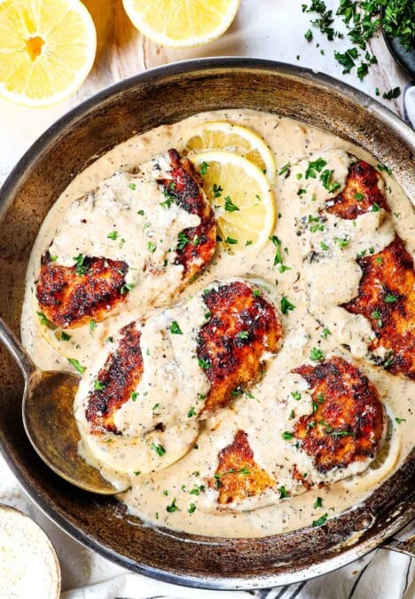 Top view of Lemon Chicken in a skillet with creamy lemon sauce