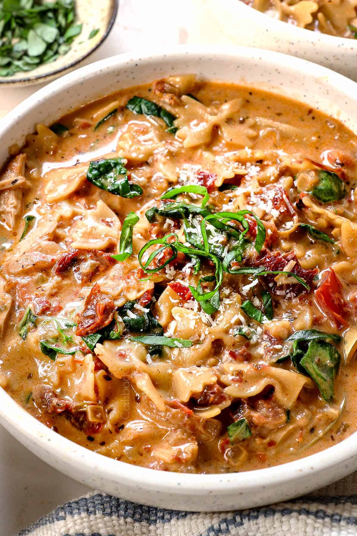 up close of Marry Me Chicken Soup in a bowl showing how creamy it is and what pasta to use
